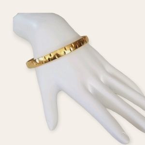 Vintage Signed MONET Etched Gold Tone Bangle Bracelet